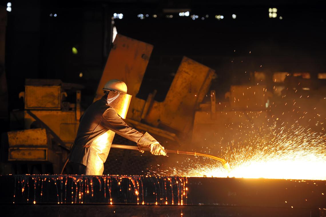 Photo of a man welding.